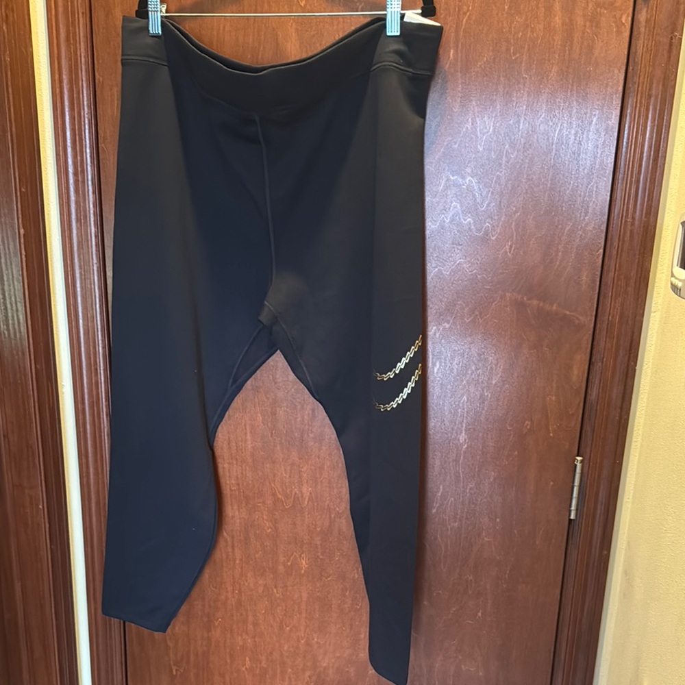 Nike Black Leggings with Metallic Gold Nike symbol
